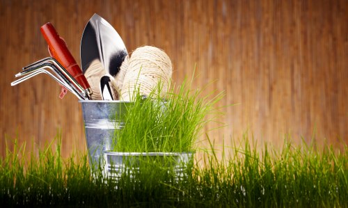 Professional gardener trimming hedges in Sydenham