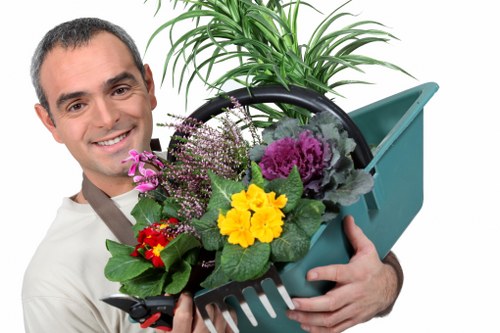 Professional landscapers enhancing curb appeal of a Sydenham home